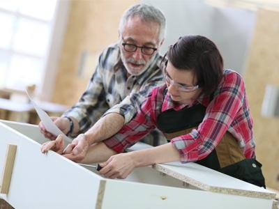 adult students in woodworking class